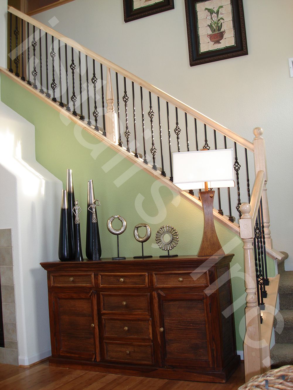 Maple Staircase with Iron Balusters Maple w/iron balusters turned post-to-post